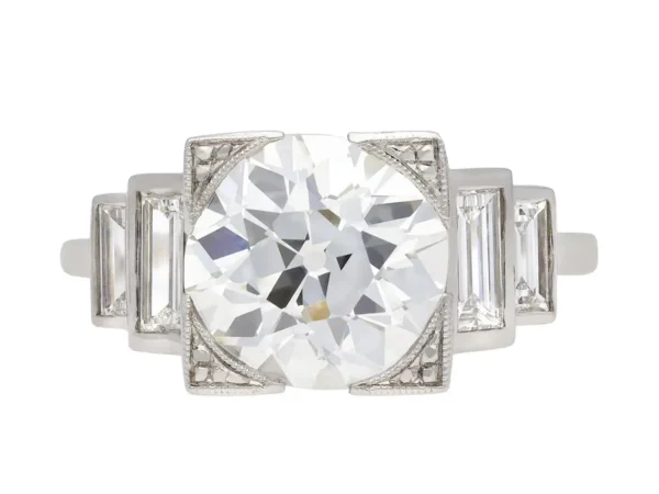 Art Deco diamond flanked solitaire ring, English, circa 1930.