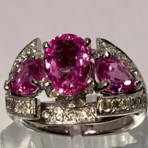 Spectacular Vivid Pink Sapphire Diamond Platinum Three-Stone Ring